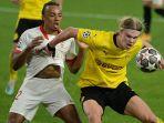 jules-kounde-erling-haaland-sevilla-vs-borussia-dortmund.jpg