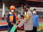 kabagops-polres-tapin-akp-raindhard-maradona-menyerahkan-dayung-selasa-17112020.jpg