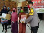 kapolres-tanbu-akbp-sugianto-marweki-sik-berikan-bantuan-ke-warga-kurang-mampu.jpg