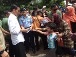 kedatangan-presiden-ri-joko-widodo-ke-desa-pematang-panjang_20180326_172512.jpg
