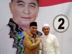 kedua-paslon-berjabat-tangan-pasca-pilkada-hss_20180629_201345.jpg