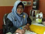 kepala-disdukcapil-banjarbaru-hj-sri-fatma-karmailita.jpg