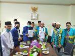 ketua-baznas-kalsel-pangeran-hg-rusdi-effendi-ar-ketua-dpw-ipi-kh-m-mukri-yunus.jpg
