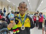 ketua-npc-kalsel-ahmad-firdaus-turut-meraih-medali-perak.jpg