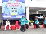 ketua-tp-pkk-hj-raudhatul-wardiyah-mencanangkan-dimulainya-gebrak-masker.jpg