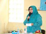 ketua-tp-pkk-kabupaten-banjar-hj-raudathul-wardiyah-saat-memberikan-sambutan.jpg