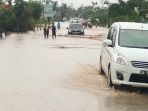 kondisi-jalan-nasional-di-sekapuk-satui-tanahbumbu_20180906_162433.jpg