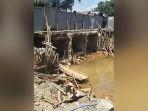 kondisi-jembatan-di-desa-kintap-kecil-yang-sedang-dalam-proses-perbaikan.jpg