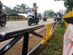 kondisi-pembatas-ketinggian-jembatan-yang-patah-di.jpg