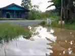luapan-air-Sungai-Jejangkit-di-Desa-Lok-Rawa-Batola-kalsel-Sabtu-15042023.jpg