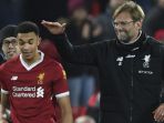 manajer-liverpool-juergen-klopp-kanan-memberikan-selamat-kepada-bek-sayap-trent-alexander-arnold_20180515_071442.jpg
