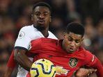 marcus-rashford-dan-serge-aurier-berduel-memperebutkan-bola-pada-pertandingan-man-united.jpg