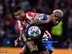 marcus-rashford-manchester-united-vs-atletico-madrid-mozambik-reinildo.jpg