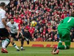 marcus-rashford-mencetak-gol-kedua-ke-gawang-liverpool_20180310_225002.jpg