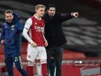 martin-odegaard-mikel-arteta-arsenal-manchester-united.jpg
