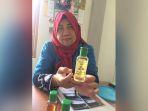 minyak-urut-massage-oil-dari-bunga-melati-produk-dinas-tph-kabupaten-banjar_wm.jpg