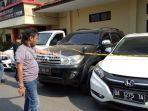 mobil-dengan-dokumen-palsu-diamankan-di-mapolda-kalsel.jpg