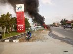 mobil-terbakar-spbu-palangkaraya_20180606_124440.jpg