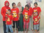 orangtua-bersama-anak-penderita-down-syndrome.jpg