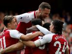 para-pemain-arsenal-merayakan-gol-danny-welbeck_20170909_225349.jpg