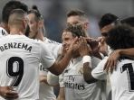 para-pemain-real-madrid-merayakan-gol-yang-berhasil-dicetak-karim-benzema_20180907_082149.jpg
