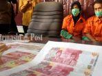 pasutri-yang-jadi-pelaku-penyebaran-uang-palsu-di-hsu.jpg