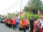 pc-pgri-amuntai-tengah-melaksanakan-jalan-santai-berhadiah-menyambut-hari-kemerdekaan-ri.jpg