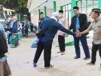 pejabat-Pemerintah-Kabupaten-Kapuas-menyambut-kedatangan-jemaah-haji-13072023.jpg