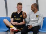 pelatih-belgia-roberto-martinez-kanan-dan-gelandang-kevin-de-bruyne_20180706_073856.jpg