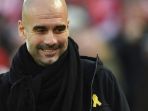 pelatih-manchester-city-pep-guardiola_20180310_072239.jpg