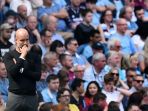 pelatih-manchester-city-pep-guardiola_20180725_074803.jpg