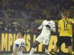 pemain-depan-dortmund-dari-norwegia-erling-braut-haaland-kanan-mencetak-skor.jpg