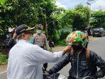 pemeriksaan-suhu-tubuh-di-perbatasan-balangan.jpg