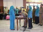 penandatanganan-berita-acara-pelantikan-tp-pkk-desa.jpg
