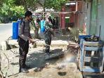 penyemprotan-disinfektan-di-hst.jpg