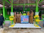 penyerahan-alat-cuci-tangan-portable.jpg