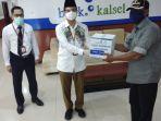 penyerahan-paket-sembako-dari-bank-kalsel.jpg