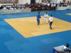 perebutan-medali-perunggu-antara-judoka-kalsel-muhamad-refly-putih-kontra-judoka-jepang.jpg