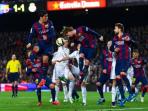 pertandingan-antara-barcelona-dan-real-madrid_20151022_232936.jpg