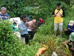 petugas-dari-dinas-sosial-dinsos-kabupaten-kapuas-bersama-tag.jpg