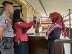 petugas-penjaga-posko-pengamana-njung-yang-datang-ke-mako-polres-balangan.jpg