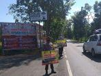 petugas-polsek-kapuas-hilir-kapuas-kalimantan-tengah-imbau-pengendara-kamis-2782020.jpg