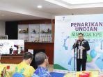 plt-dirut-bank-kalsel-igk-prasetya-sambutan-pada-penarikan-undian-simpeda-kpe-11112021.jpg