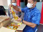 polisi-bongkar-gudang-penimbunan-minyak-goreng.jpg