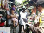 polisi-dan-tni-di-kota-palangkaraya-kalteng-sosialisasi-pencegahan-covid-19-kamis-752020.jpg