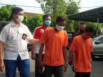 polisi-mengamankan-dua-orang-tersangka-kasus-dugaan-tindak-pidana.jpg