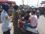 polres-tabalong-penegakan-disiplin-protokol-kesehatan-di-pasar-kelua.jpg