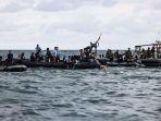 prajurit-tni-al-melakukan-pencarian-korban-dan-puing-pesawat-sriwijaya-air_098.jpg