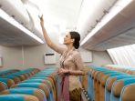 pramugari-menunjukkan-kabin-pesawat-terbaru-garuda-indonesia-a330-900-neo.jpg