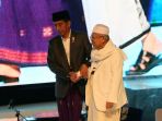 presiden-joko-widodo-menggandeng-ketua-mui-kh-maruf-amin_20180810_075852.jpg